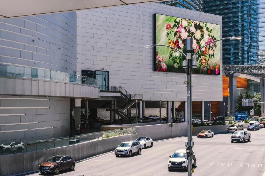 Digital billboard in a premium urban location demonstrating DOOH network quality beyond screen count