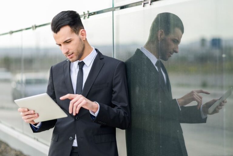 Business executive reviewing campaign performance data to maintain high Publisher Reporting Standards and strengthen advertiser trust